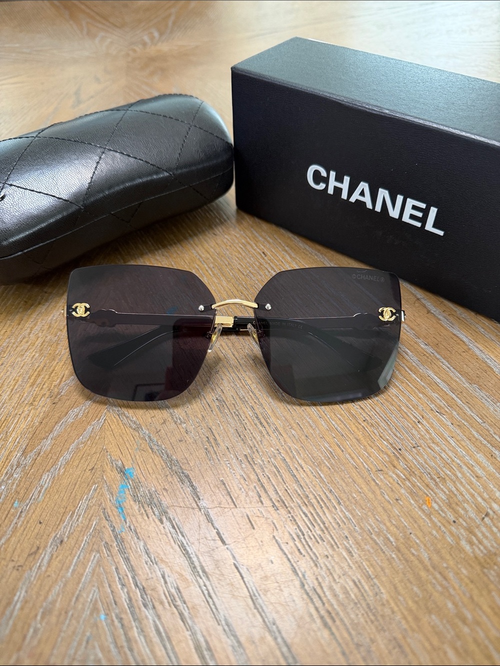 CHANEL Black Gradient Rimless Square Sunglasses with Gold Accents